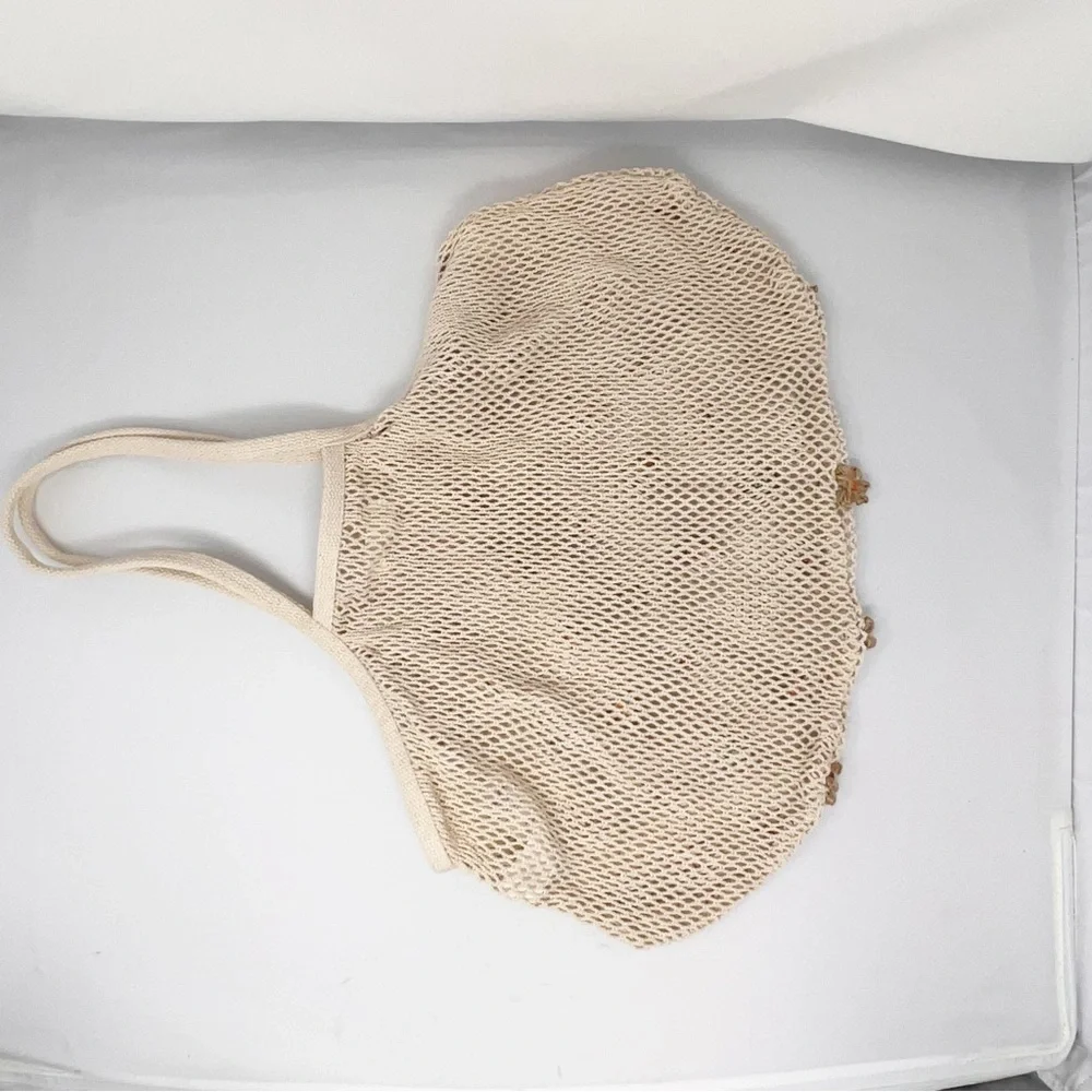 Urban outfitters- Knit bag with flowers never used - Picture 6 of 10
